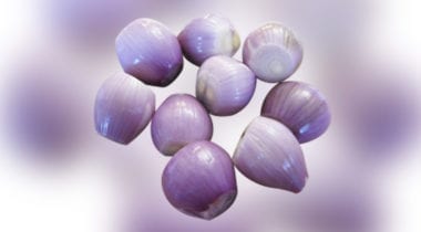 peeled shallots, purple colored