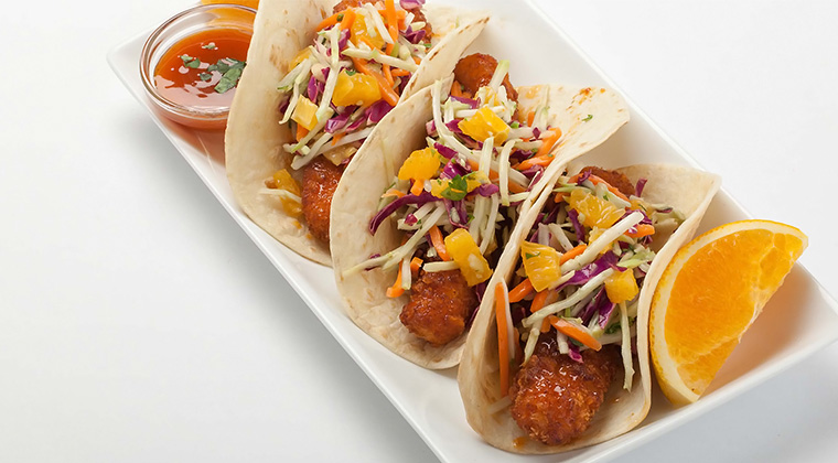 fish tacos with mango salsa and slaw
