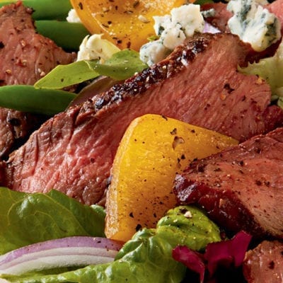 salad with sliced beef and bleu cheese