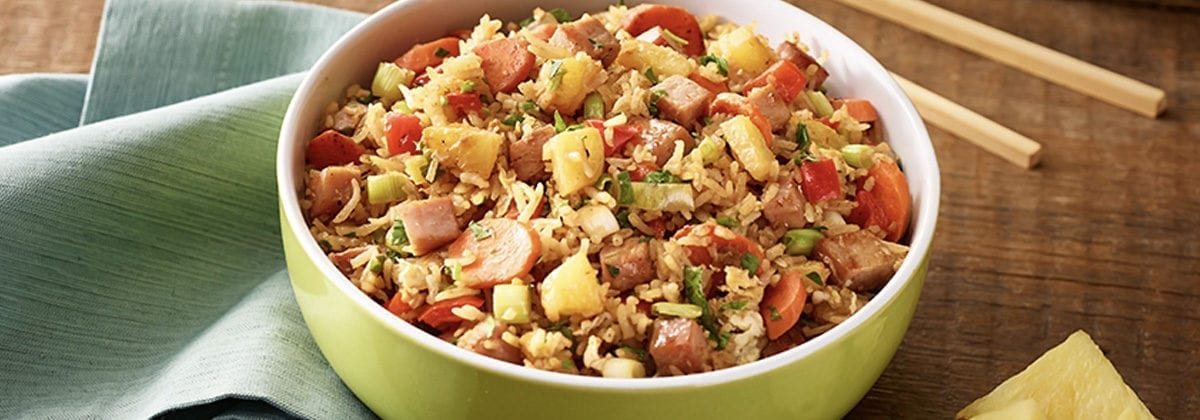 fried rice with pineapple, ham and sliced sausage