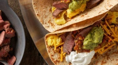 beef taco with guacamole cheese and sour cream