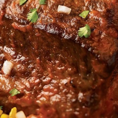 chipotle braised beef ribs with yellow rice