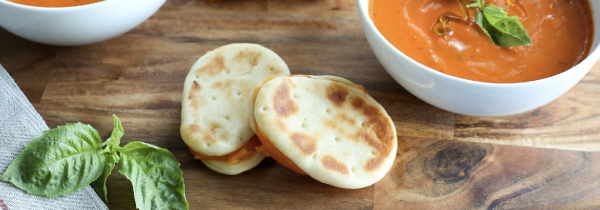 mini naan bread and bowls of sauce