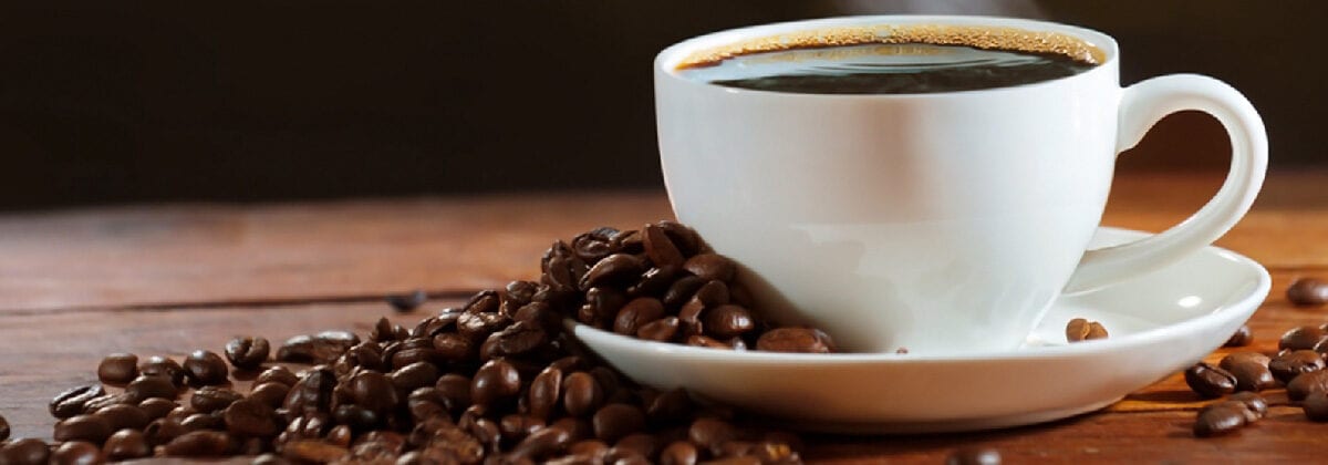cup of coffee with coffee beans