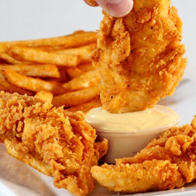chicken tenders and French fries with honey mustard dipping sauce