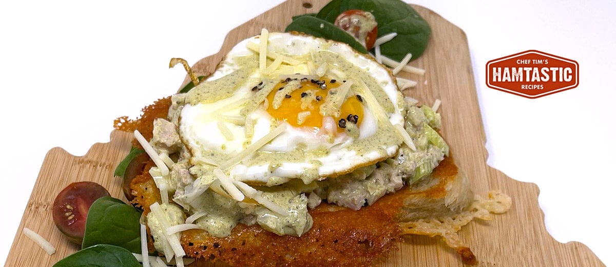 open face sandwich on maine cutting board, sunny side egg