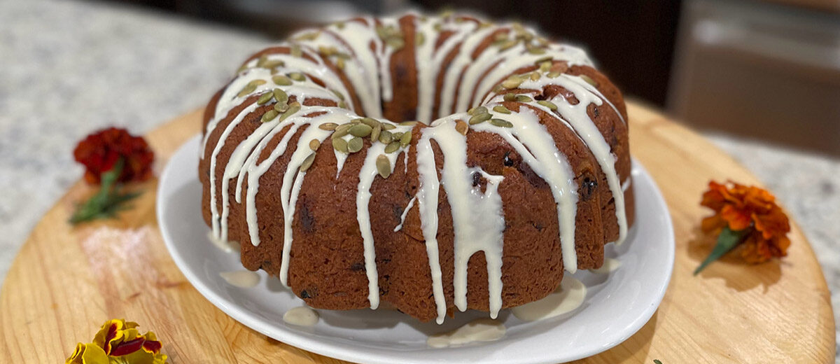 bundt cake with frosting on counter