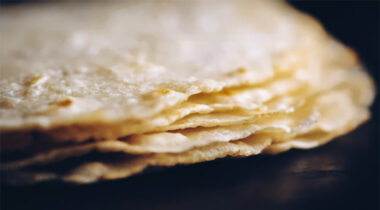 close up of stack of white sandwich wraps